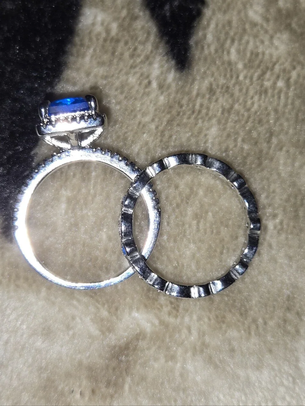 Blue Emerald-Cut Halo Ring with Accent Stones